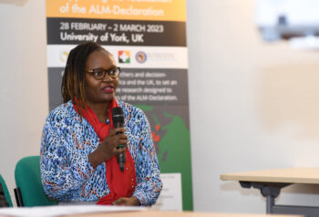 Mrs. Kate Langwe speaking during the policy-maker panel session